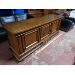 An early twentieth century carved oak low sideboard CONDITION REPORT: 210cm wide by