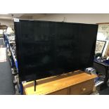 An LG 43 inch LCD TV with remote