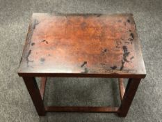 An early 20th century Chinese red lacquered lamp table,