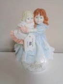 A Royal Worcester figure, Love,