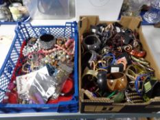 Two crates of costume jewellery,