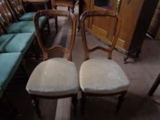 A pair of nineteenth century dining chairs