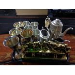 A tray of three piece plated tea service, plated goblets,