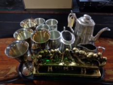 A tray of three piece plated tea service, plated goblets,