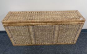 A large wicker storage box