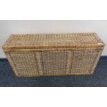 A large wicker storage box