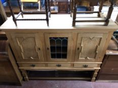 An mid century blond oak sideboard, height 131.5 cm, width 155 cm and depth 48 cm.