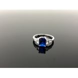 A Sterling silver Art Deco style square cut ring set with a blue stone, size N.