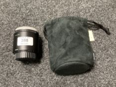 A Nikon AF-S TC-20E II 2X Teleconverter lens, with both caps, in Nikon soft black carry pouch.