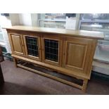 A mid century blond oak sideboard CONDITION REPORT: 210cm long by 50cm deep by