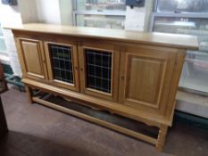 A mid century blond oak sideboard CONDITION REPORT: 210cm long by 50cm deep by