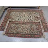 A Tabriz design rug with matching runner (2)