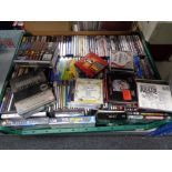 A crate of very large quantity of CDs and DVDs