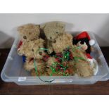 A collection of modern teddy bears and soft toys.