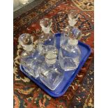 A set of five Dartington Crystal decanters,