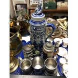 A tray of large ceramic stein,