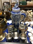 A tray of large ceramic stein,