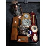 A tray of nautical reproduction pieces including telescope, barometer, lamps,