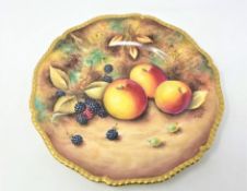 A Royal Worcester fruit painted plate by T.