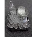 A tray of crystal, whisky glasses,