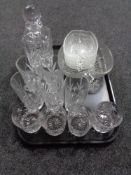 A tray of crystal, whisky glasses,