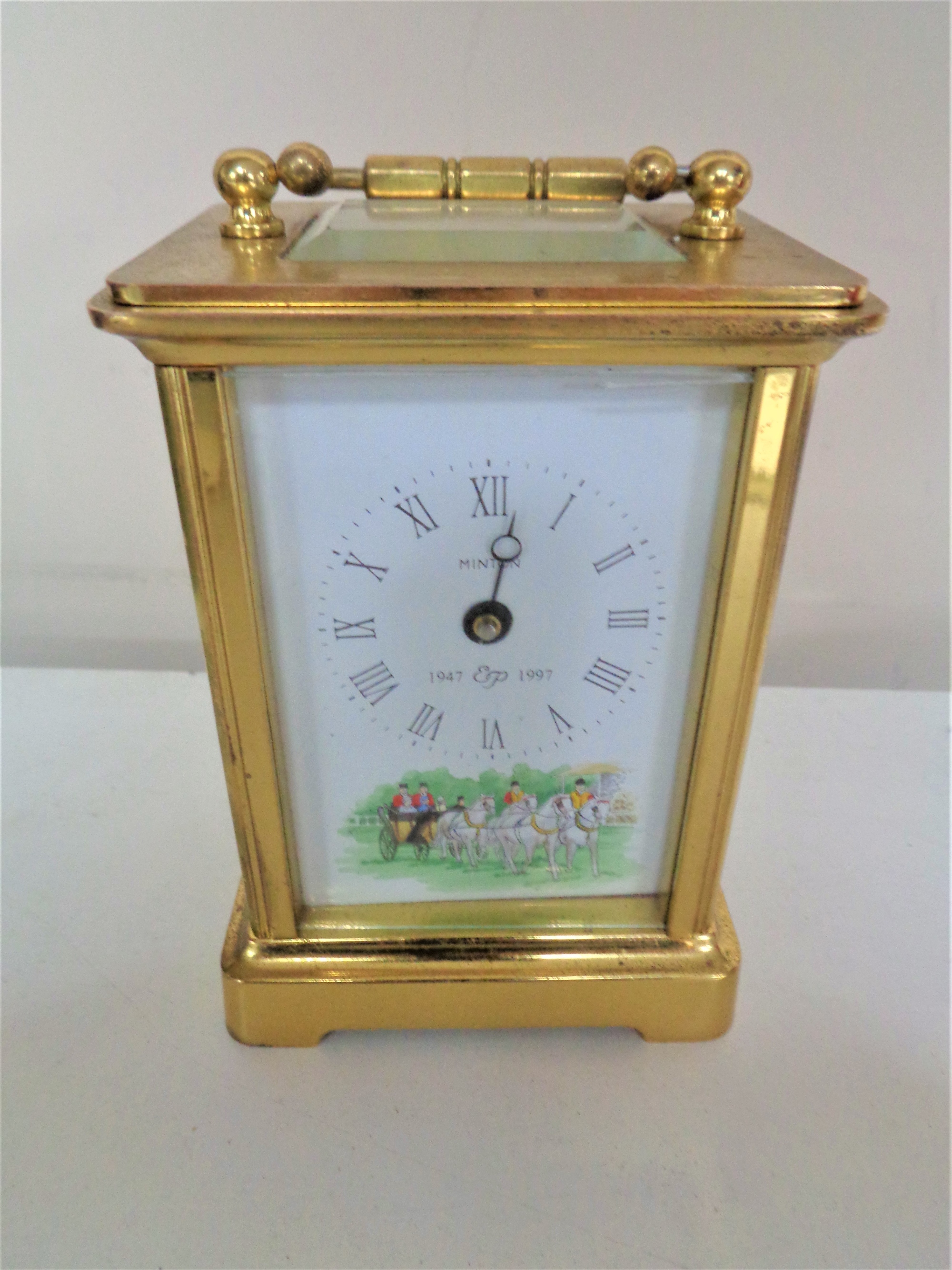 A brass cased Rapport carriage clock