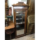 A nineteenth century mahogany bevelled wall mirror