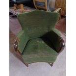 An early twentieth century pine framed armchair