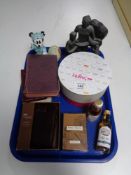 A tray of collectables including pocket Holy bible, two miniature bottles of whisky,