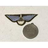 A Parachute regiment cloth badge and medal