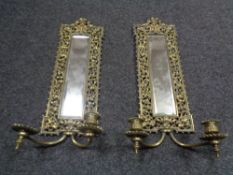 A pair of ornate brass framed mirrors with candles sconces (Af)