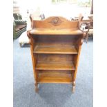 A set of Edwardian oak bookshelves CONDITION REPORT: 61cm wide by 30cm deep by