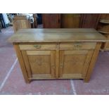 An early twentieth century carved oak sideboard CONDITION REPORT: 130cm wide by