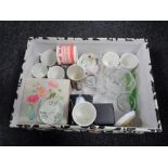A crate of ceramics and glass including Royal Doulton Snowman collection mugs,
