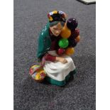 A Royal Doulton figure - The old Balloon seller HN 1315