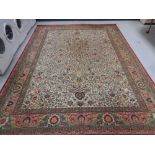 A machined Tabriz design carpet,