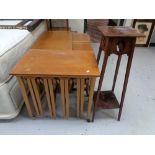 A twentieth century teak table fitted with four beneath together with an Edwardian plant stand