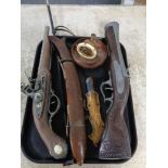 A tray of ornamental flint lock pistols, decorative knife in sheath,
