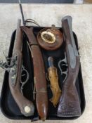 A tray of ornamental flint lock pistols, decorative knife in sheath,