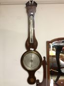 A 19th century banjo barometer with silvered dial