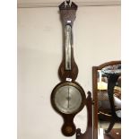 A 19th century banjo barometer with silvered dial