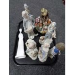 A tray of ceramic figures,
