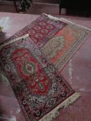 Three fringed eastern rugs