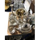 A tray of silver plated items,