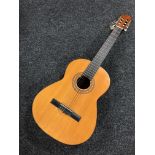 An acoustic Spanish guitar