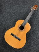 An acoustic Spanish guitar