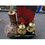 A crate of table lamps, metal framed ceiling lights,