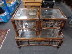 A banjo and wicker glass topped coffee table together with a pair of matching side tables