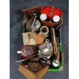 A box of binoculars, religious items, clothes brushes,