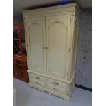 A contemporary double wardrobe fitted with four drawers CONDITION REPORT: 207 cm x